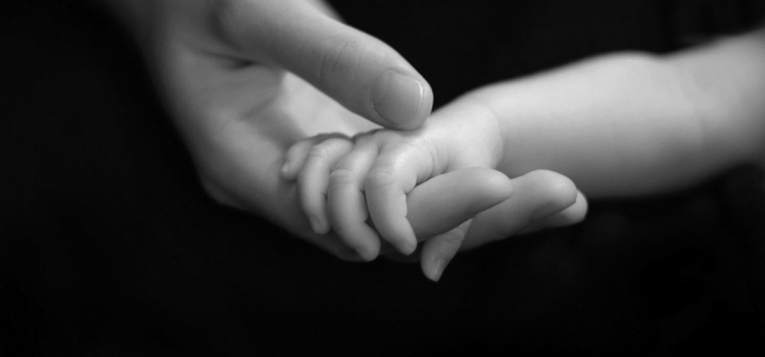 infant-holding-hands